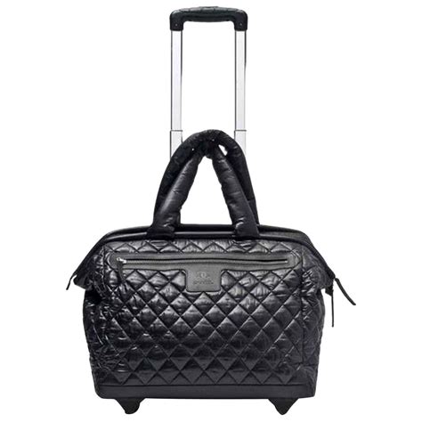 chanel carry on luggage with wheels|Chanel website.